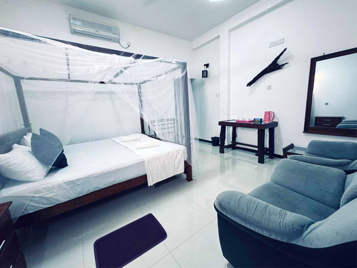 Spacious bathroom with modern fixtures at Udawalawe Elegarden Hotel