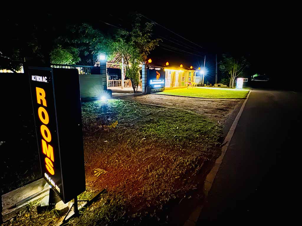 Luxury room at Udawalawe Elegarden Hotel with comfortable bedding and modern amenities